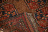 Vintage Beshir rug corner, showing original dark goat hair triple cord selvage and fringe.