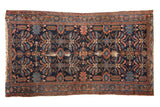 Early 20th century hand-knotted Mehriban rug, navy blue field with germinating plant motifs.