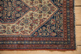 Antique Senneh rug corner, intricate Herati pattern, navy and ivory tones, mostly even wear.
