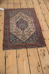 Antique Senneh rug border with intricate Herati motif, navy, ivory, terracotta, and refreshed side selvage.