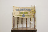 Vintage canvas carpenter's apron with blue and yellow Flintkote logo and text.