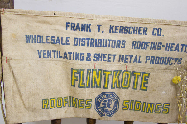 Frank T. Kerscher Co. and Flintkote branding in blue and yellow on a canvas apron.