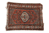 Hand-knotted vintage Hamadan rug: geometric medallion, brick red Herati field, navy, ivory.
