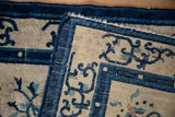 Close-up of antique Peking runner's newer cobalt blue side cord selvage.