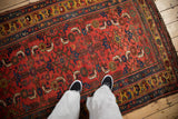 Geometric Herati design with brilliant gem-like contrast on an antique Kurdish Bijar rug.