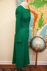 Vintage Betsey Johnson green dress side view, highlighting knit texture and wooden buttons.
