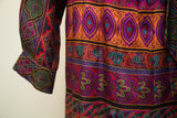 Vintage Oscar de la Renta dress with intricate purple, orange, and teal psychedelic pattern.