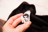 Collectible vintage 80s Betsey Johnson black punk label, showing graphic face.