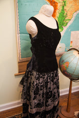 Vintage 50s black velvet top with floral skirt and tiered fringe detail.