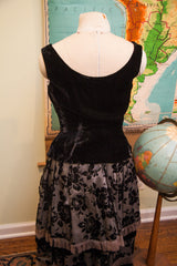 Vintage 50s French black velvet dress top, back view showcasing luxurious texture and scoop neckline.