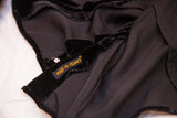 Black velvet dress ensemble, with interior lining and gold 'Made in France' label.