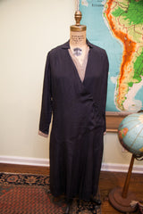 Vintage navy blue day dress with a refined pleated lower skirt.