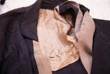 Vintage 1920s navy blue dress's lapel and light beige Art Deco belt with snap.
