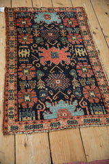 Vibrant madder red Harshang motifs, subtle abrashes, and fine weave on an antique Senneh rug.