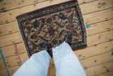 Antique Lilihan Persian rug, interlaced floral vines on an unusual ivory beige ground.