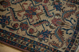 Hand-knotted Lilihan rug pile featuring blue, rose vines and serrated leaves on ivory ground.