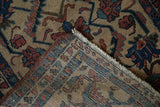 Antique Lilihan rug's dense hand-knotted foundation, fringe, and machine binding.