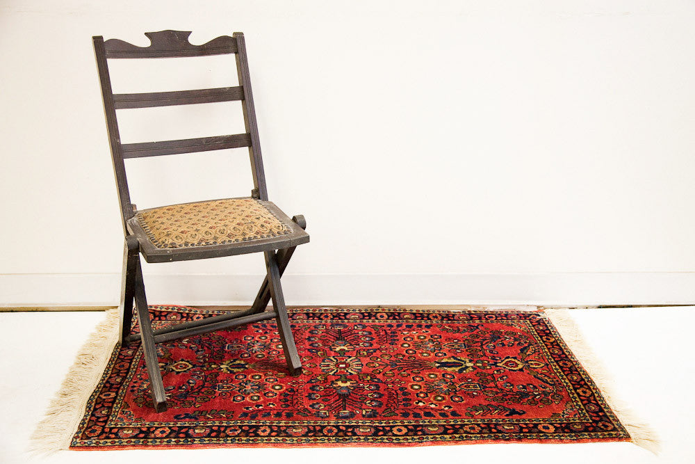 Vintage 1920s Sarouk Persian rug, rich red, intricate floral, fine weave, ivory fringe, 2'1" x 4'4".