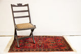 Vintage 1920s Sarouk Persian rug, rich red, intricate floral, fine weave, ivory fringe, 2'1