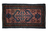 Antique Mehriban rug with geometric ram's horn and floral motifs, dusty raspberry, sapphire blue, teal.