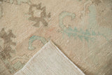 Vintage distressed Oushak runner with worn pile texture and tight foundation weave.