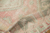 Close-up of the time-softened texture and low pile on this hand-knotted vintage Oushak.