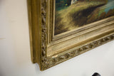 Ornate gold frame corner with visible patina on the vintage Cottage on the Lake oil painting.