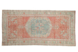 Vintage Distressed Oushak runner with mint green medallion and blush rose abrashed field.