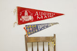 Blue Halifax N.S. felt flag with provincial crests and discoloration at the curled tip.