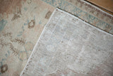 Reverse side of the hand-knotted vintage distressed Oushak rug, showing its tight weave.