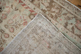 Hand-knotted foundation and secured side cord of a distressed vintage Oushak rug runner.