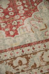 Textured low pile and visible knot heads on a distressed vintage Turkish Kayseri rug.