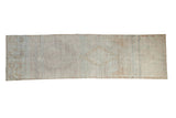 Distressed overdyed Turkish runner rug with faint geometric medallions, platinum and pale bronze tones, 2'8