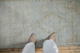 Vintage Distressed Turkish Runner with soft, worn texture and muted platinum, powder blue, and bronze tones.