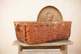Antique Large Basket, rustic woven splint oak with dark patina, 24 inches long.