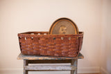Primitive splint oak basket with dark patina and rustic woven texture.