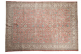 Distressed vintage Turkish Sparta carpet, faded coral floral field, ivory meandering border.