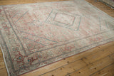 Distressed tea washed Tabriz rug border with faded Herati motif and dusty teal.