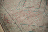 Distressed vintage Tabriz rug detail, Herati motifs and serrated dusty teal, raspberry red frame.