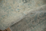 The soft, pliable texture of a distressed Kayseri carpet showing the weave's low, even pile.