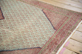Vintage Hamadan rug: dusty blue field, repeating botehs, magenta border with even wear.