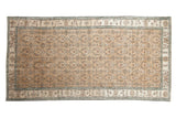 Vintage distressed Sparta rug runner with an allover roundel pattern in soft sand, ivory, and pale sky blue.