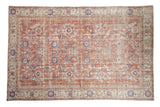 Distressed Turkish Sparta carpet, brick red field, blue floral roundels and paisley motifs.