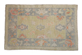Distressed Oushak rug mat featuring tropical palmettes in lime green, orange, and grey-blue, 2x3.