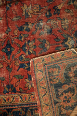 Vintage Lilihan carpet detail highlighting foundation wear, tattered edge, and floral vine pattern.