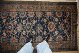 Vintage Hamadan runner detail: navy blue field with dusty rose, sky blue Veramin floral medallions.