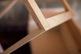 Handcrafted rabbet joint detail on the unfinished white maple sidecar frame.