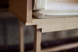Exposed rabbet joinery on the corner of the handmade white maple sidecar.