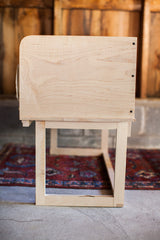 End view of the white maple sidecar showing the rounded top corner and sturdy base.
