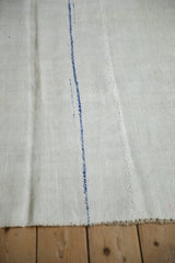 The seamed construction and plain-weave texture of a vintage Turkish hemp kilim.